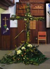 Image of the cross decorated for Easter